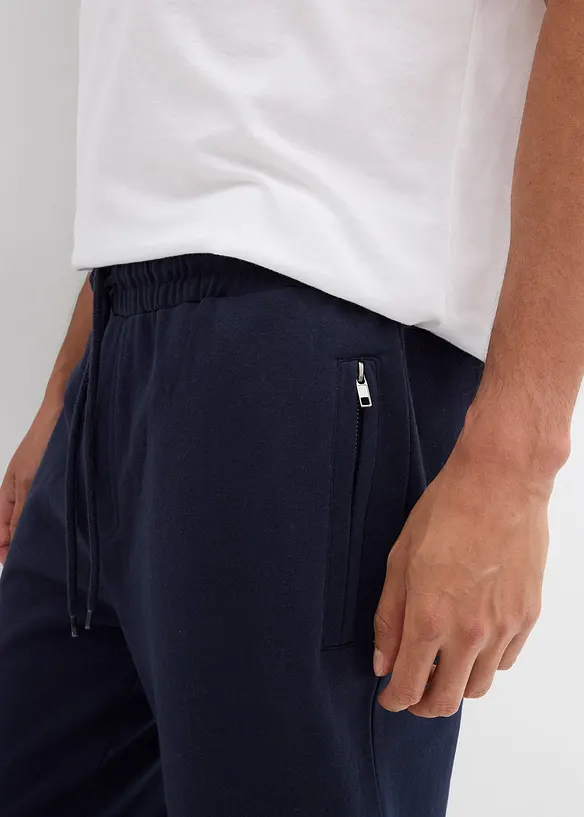 Sportovní kalhoty s praktickými kapsami na zip, bonprix