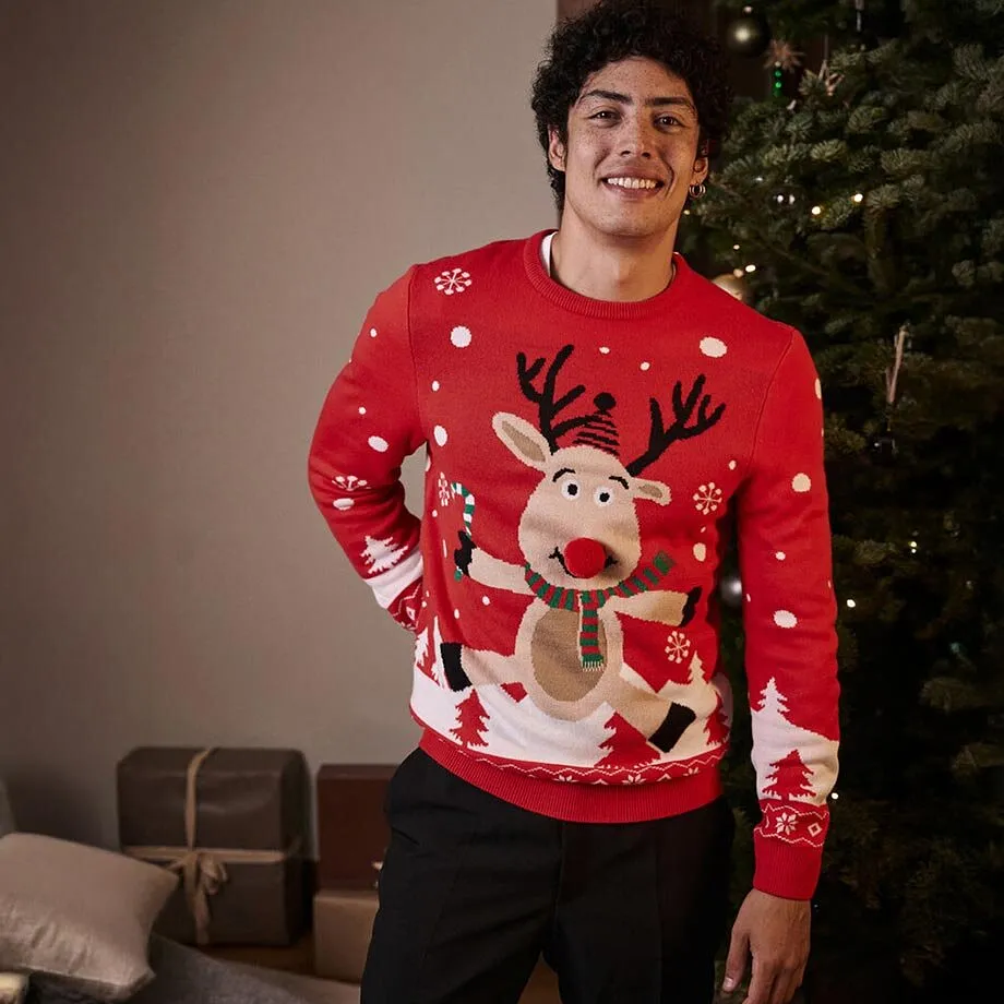 Veselý červený vánoční svetr s roztomilým motivem soba.