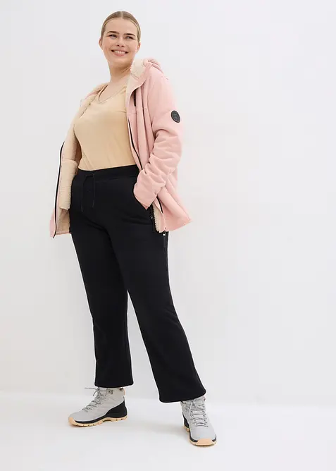 Joggingov&eacute; kalhoty s&nbsp;pod&scaron;&iacute;vkou z&nbsp;medv&iacute;dkov&eacute;ho fl&iacute;su, &scaron;irok&yacute; střih, bonprix