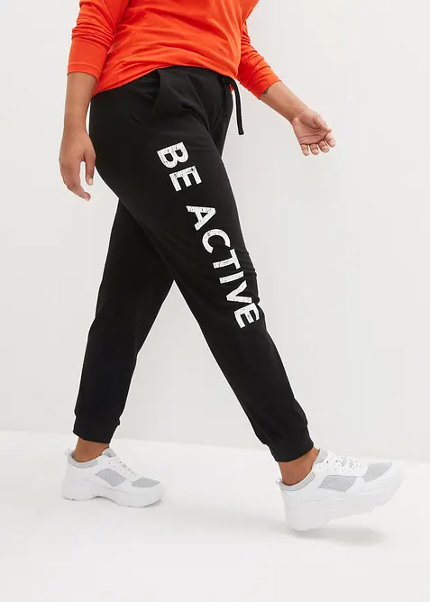 Joggingov&eacute; kalhoty z bavlny s potiskem, Loose Fit, bonprix