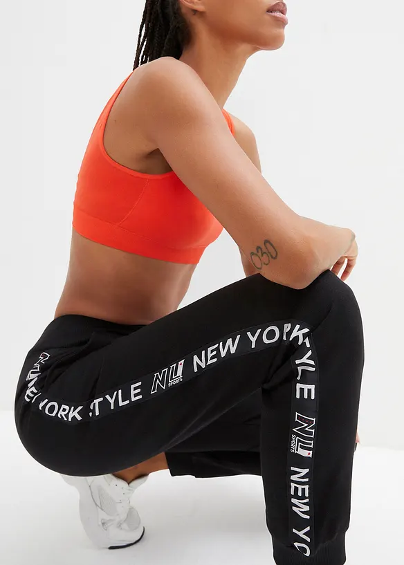 Tepl&aacute;kov&eacute; kalhoty s n&aacute;plety a potiskem, bonprix