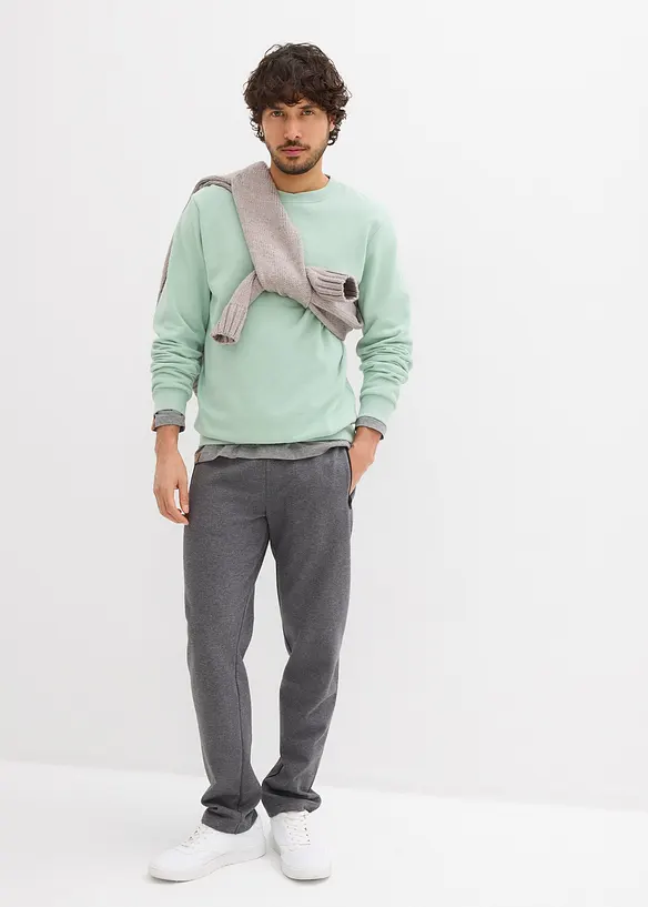 Joggingové kalhoty s praktickými kapsami na zip, z organické bavlny, bonprix