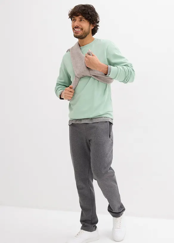 Joggingové kalhoty s praktickými kapsami na zip, z organické bavlny, bonprix