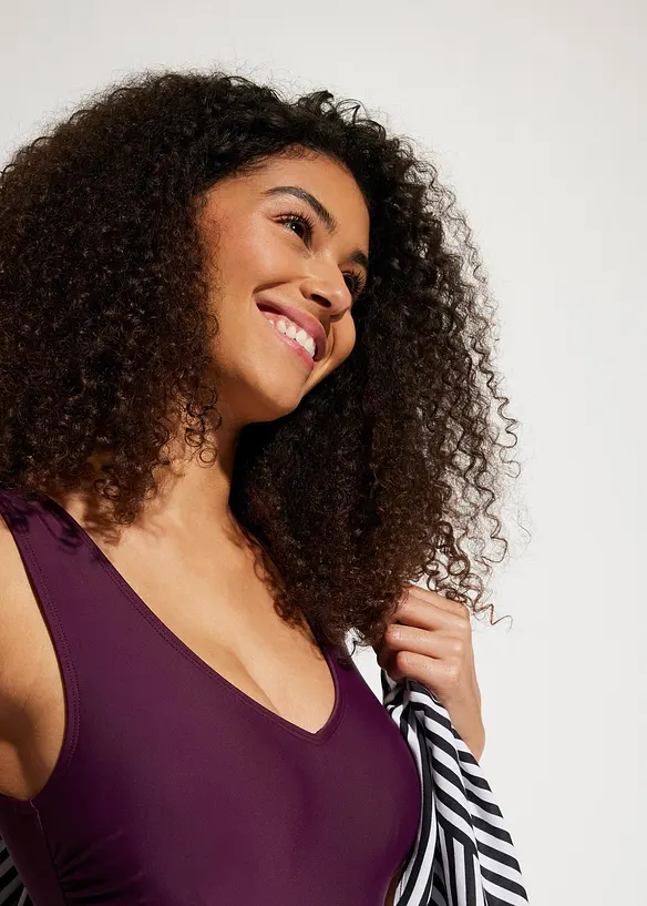 Stahovac&iacute; jednod&iacute;ln&eacute; plavky s v&yacute;střihem do V a se středn&iacute;m tvaruj&iacute;c&iacute;m efektem, bonprix