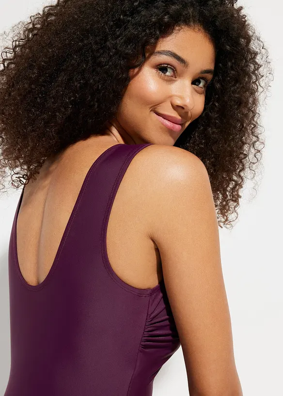 Stahovac&iacute; jednod&iacute;ln&eacute; plavky s v&yacute;střihem do V a se středn&iacute;m tvaruj&iacute;c&iacute;m efektem, bonprix