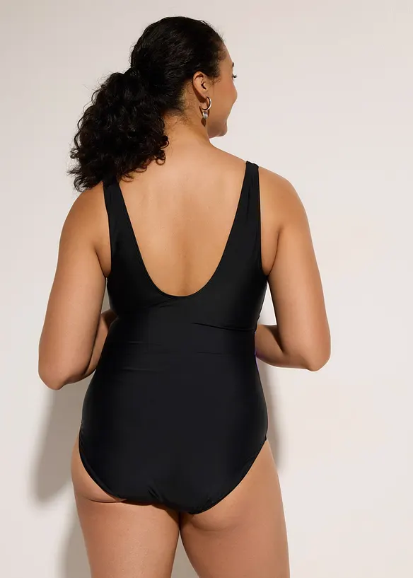 Stahovac&iacute; jednod&iacute;ln&eacute; plavky s poti&scaron;těn&yacute;mi vsadkami, středn&iacute; tvaruj&iacute;c&iacute; efekt, bonprix